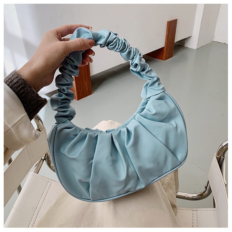 Foreign trade Korean version women's bag 2022 new solid color cloud pleated bag simple women's armpit bag sweet shoulder bag